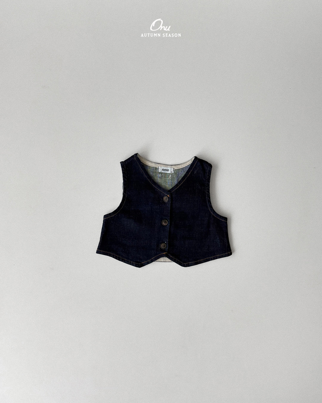 26. V-Neck Vest