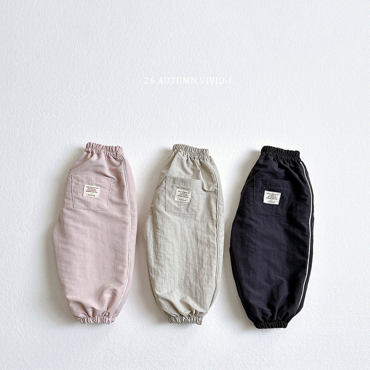 【秋のPRE-ODER 5%OFF】08.Side Stripe Label Windbreaker Jogger Pants