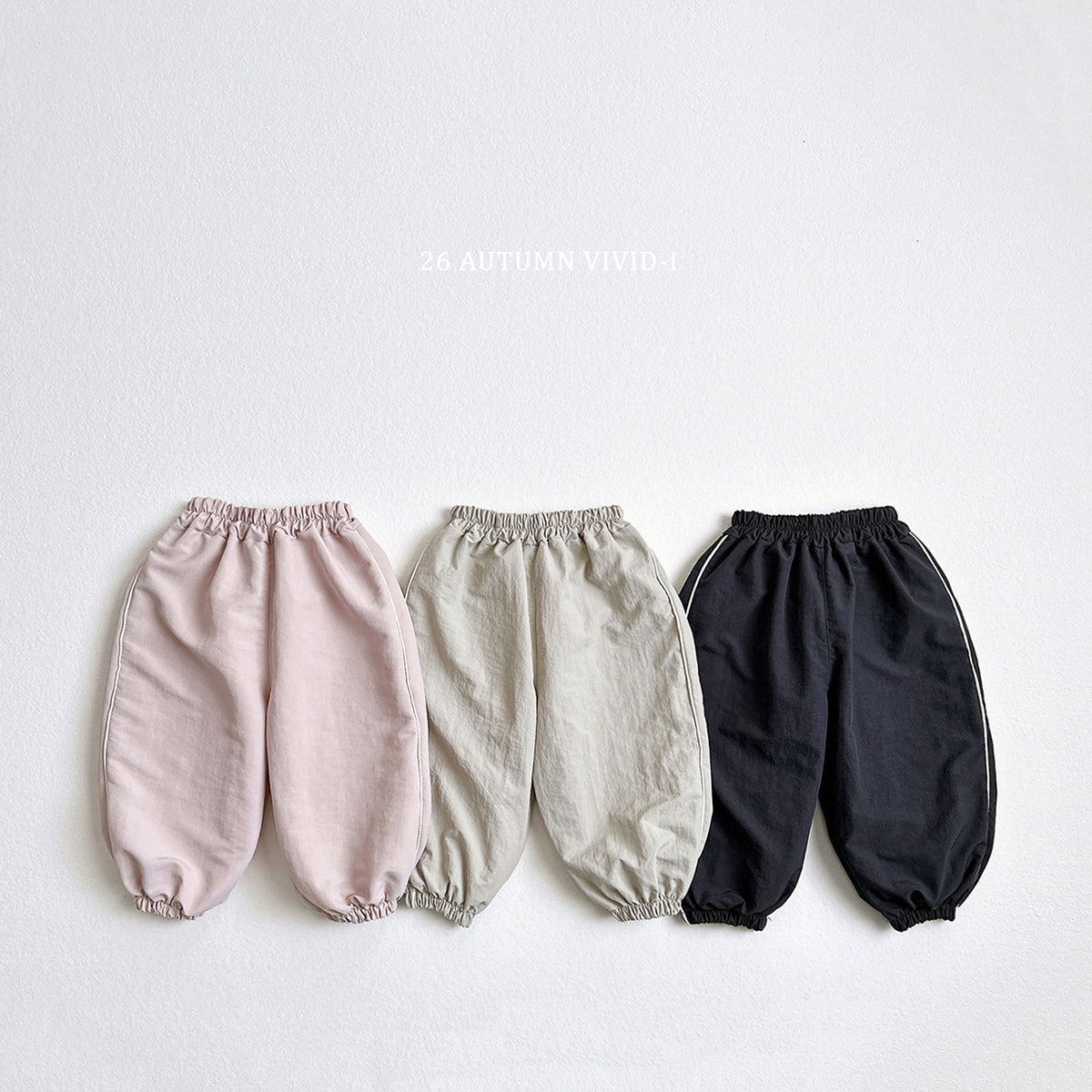 【秋のPRE-ODER 5%OFF】08.Side Stripe Label Windbreaker Jogger Pants