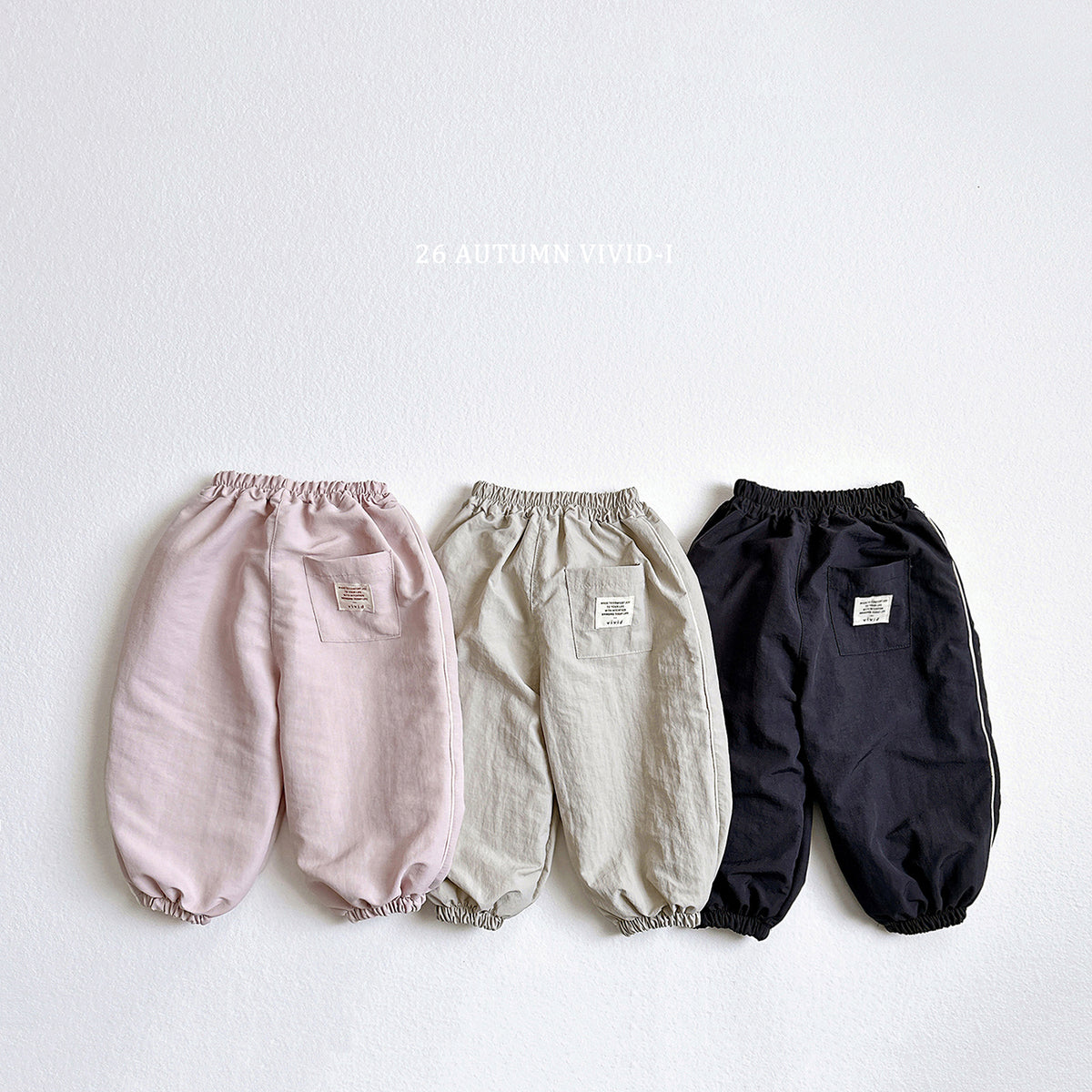 【秋のPRE-ODER 5%OFF】08.Side Stripe Label Windbreaker Jogger Pants
