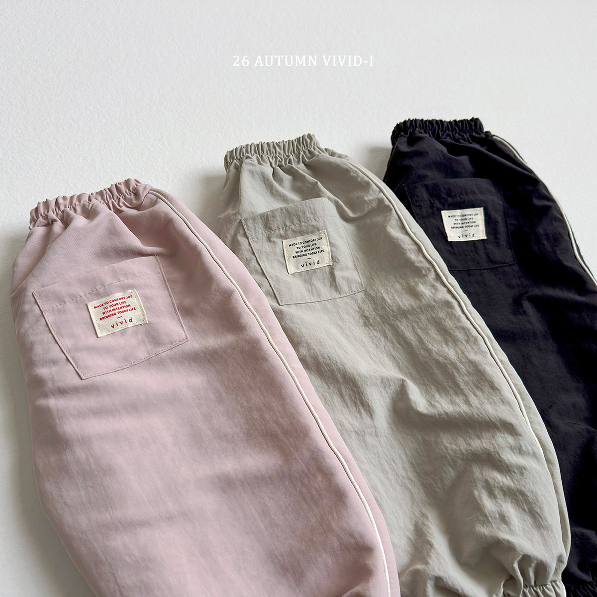 【秋のPRE-ODER 5%OFF】08.Side Stripe Label Windbreaker Jogger Pants