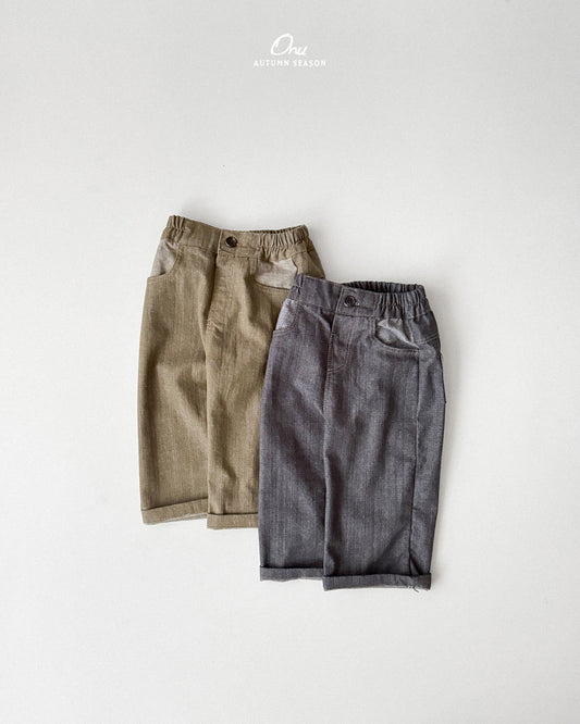 30. Stitch Denim Pants