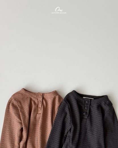 25. Cracker Button Tee