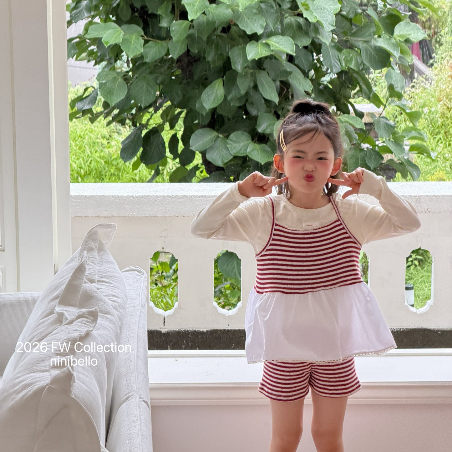 11.Tommy Striped Bustier