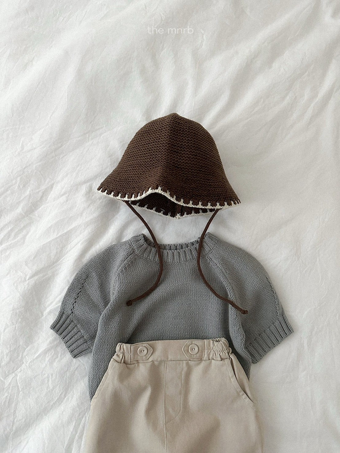 28.Emblem 3/4 Sleeve Knit Top