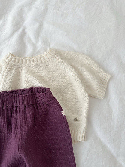 28.Emblem 3/4 Sleeve Knit Top