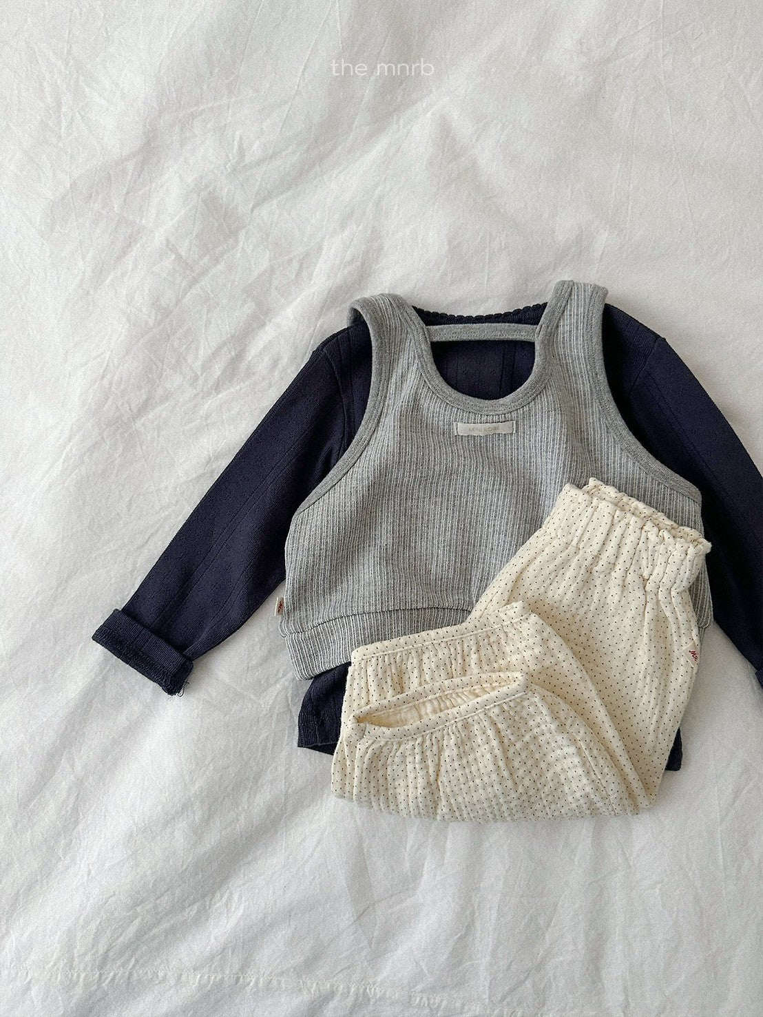 27.Etty Vest