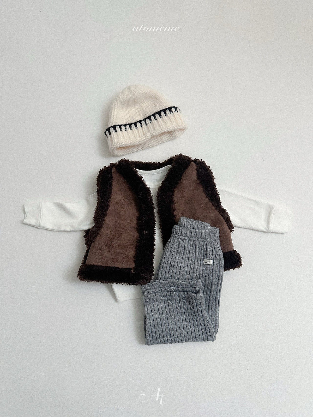 ［atomeme］reversible mustang vest