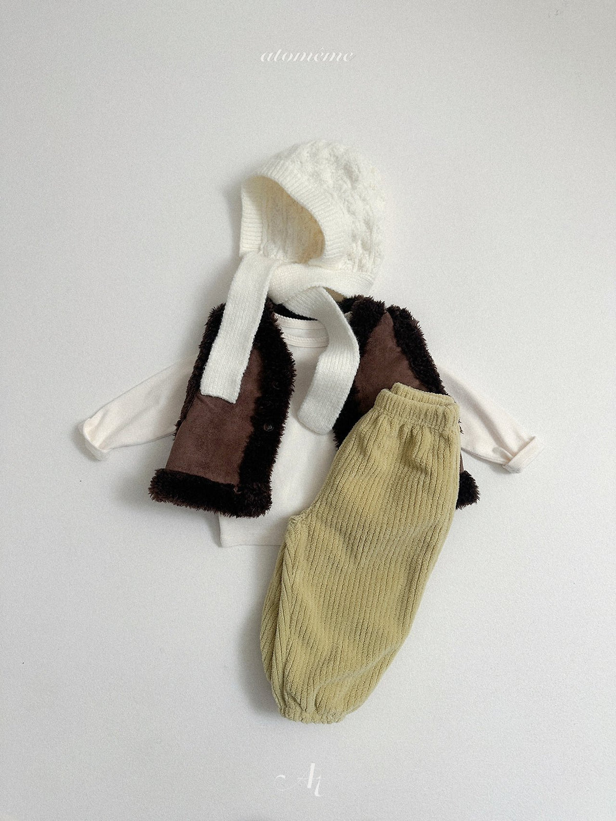 ［atomeme］reversible mustang vest