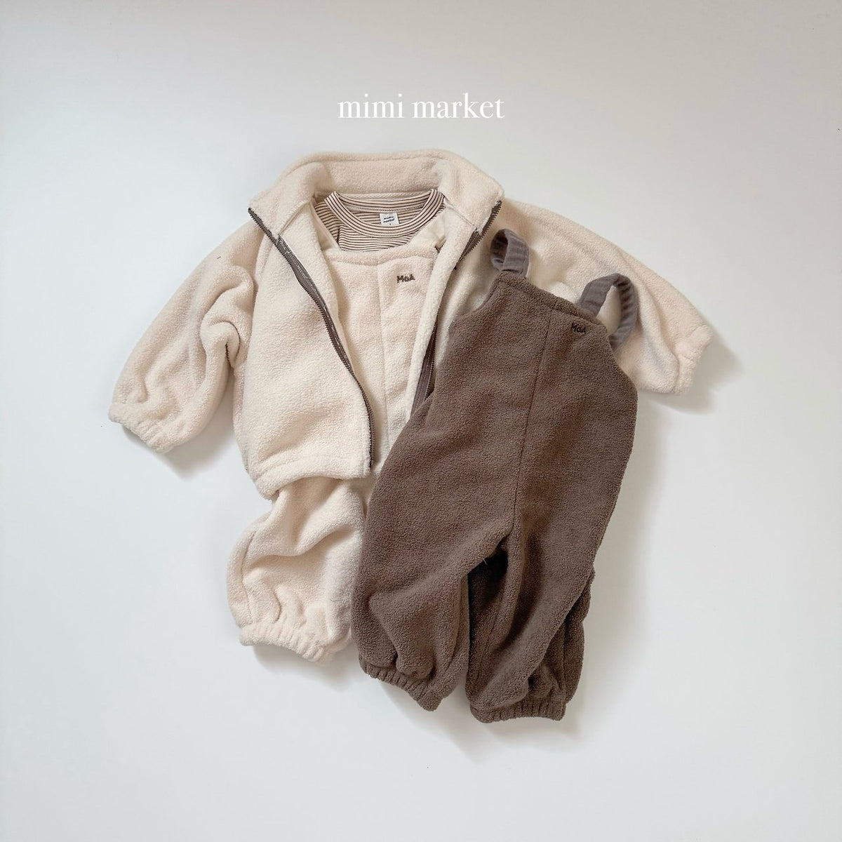 ［mimimarket］egg zip-up