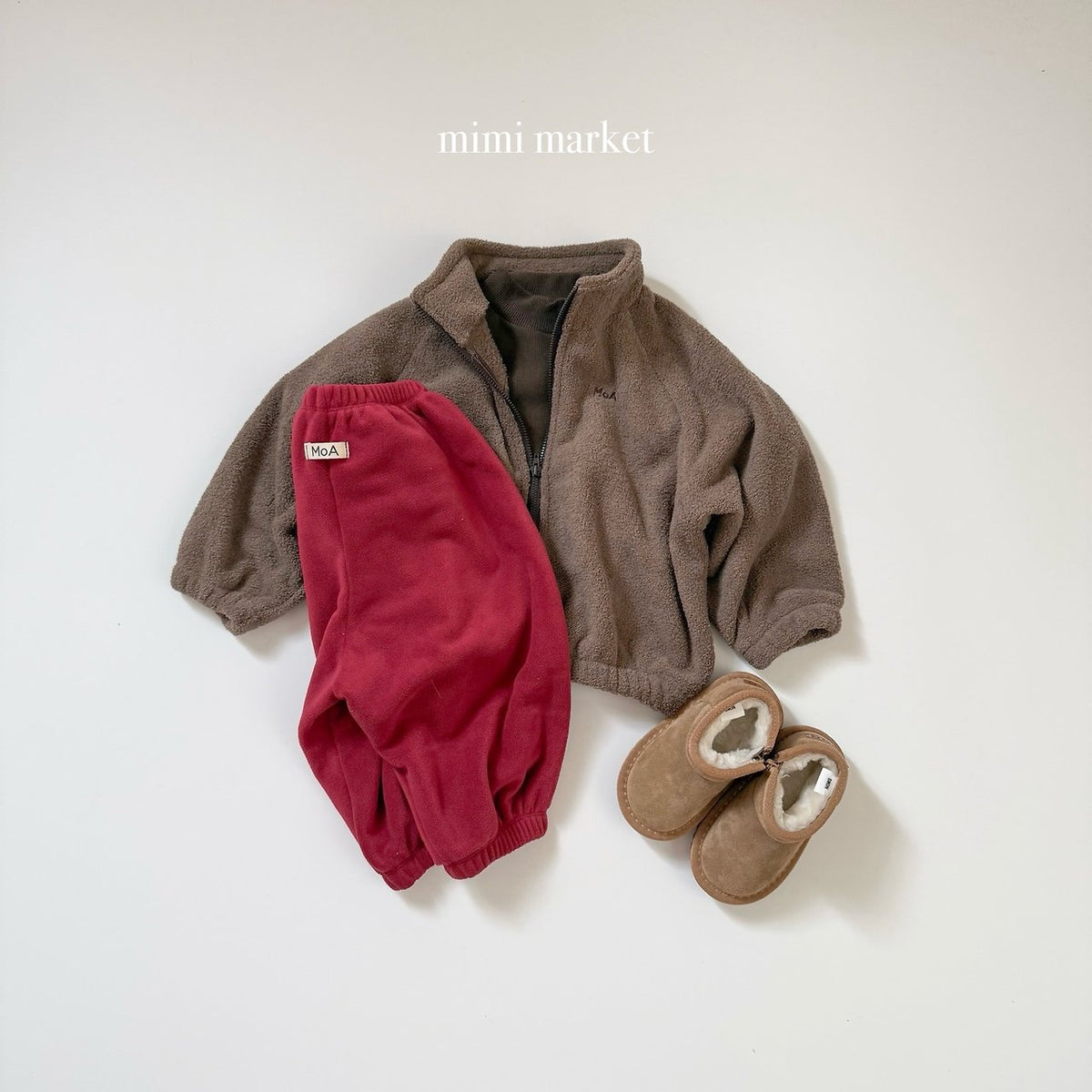 ［mimimarket］egg zip-up