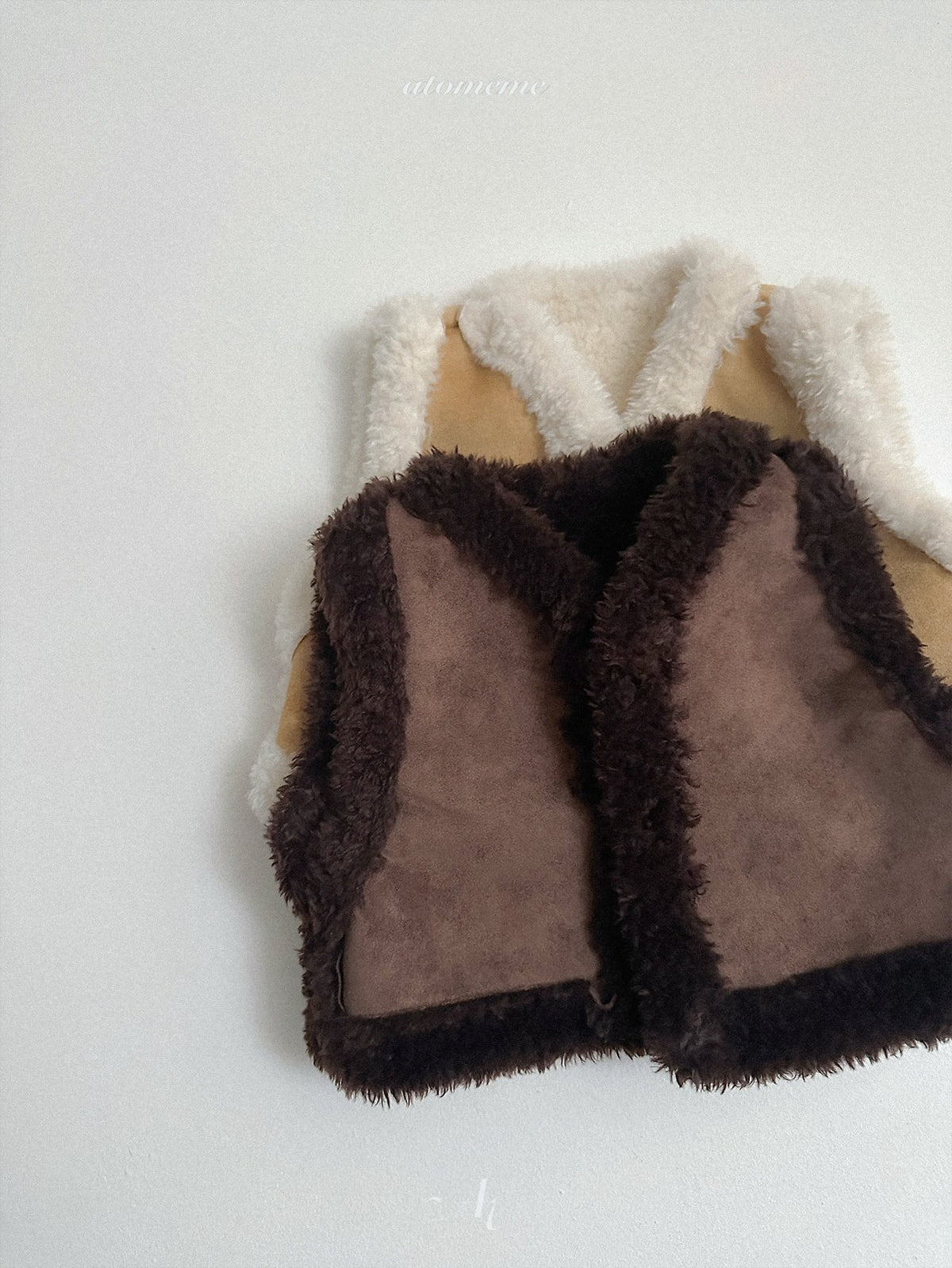 ［atomeme］reversible mustang vest