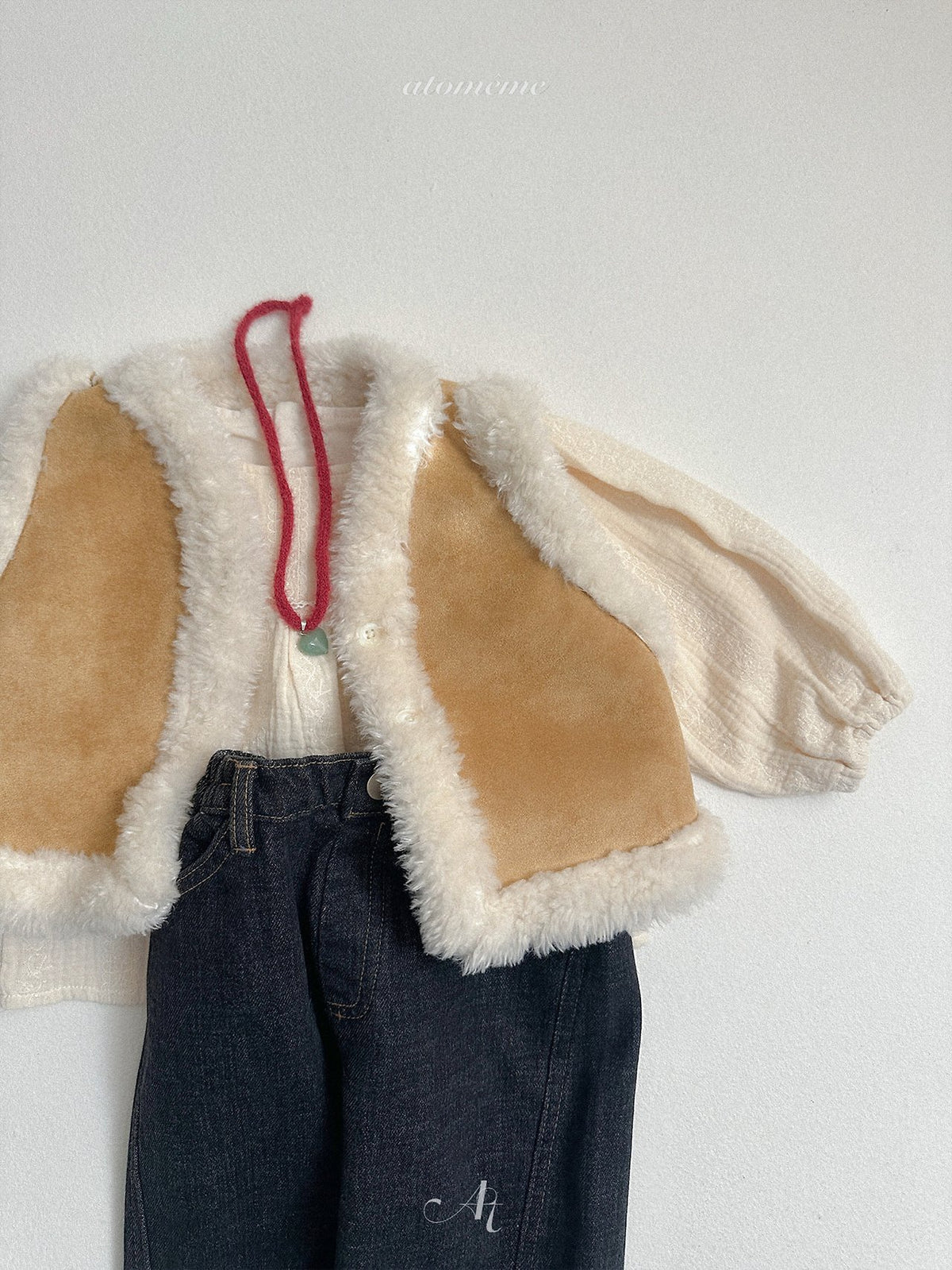 ［atomeme］reversible mustang vest