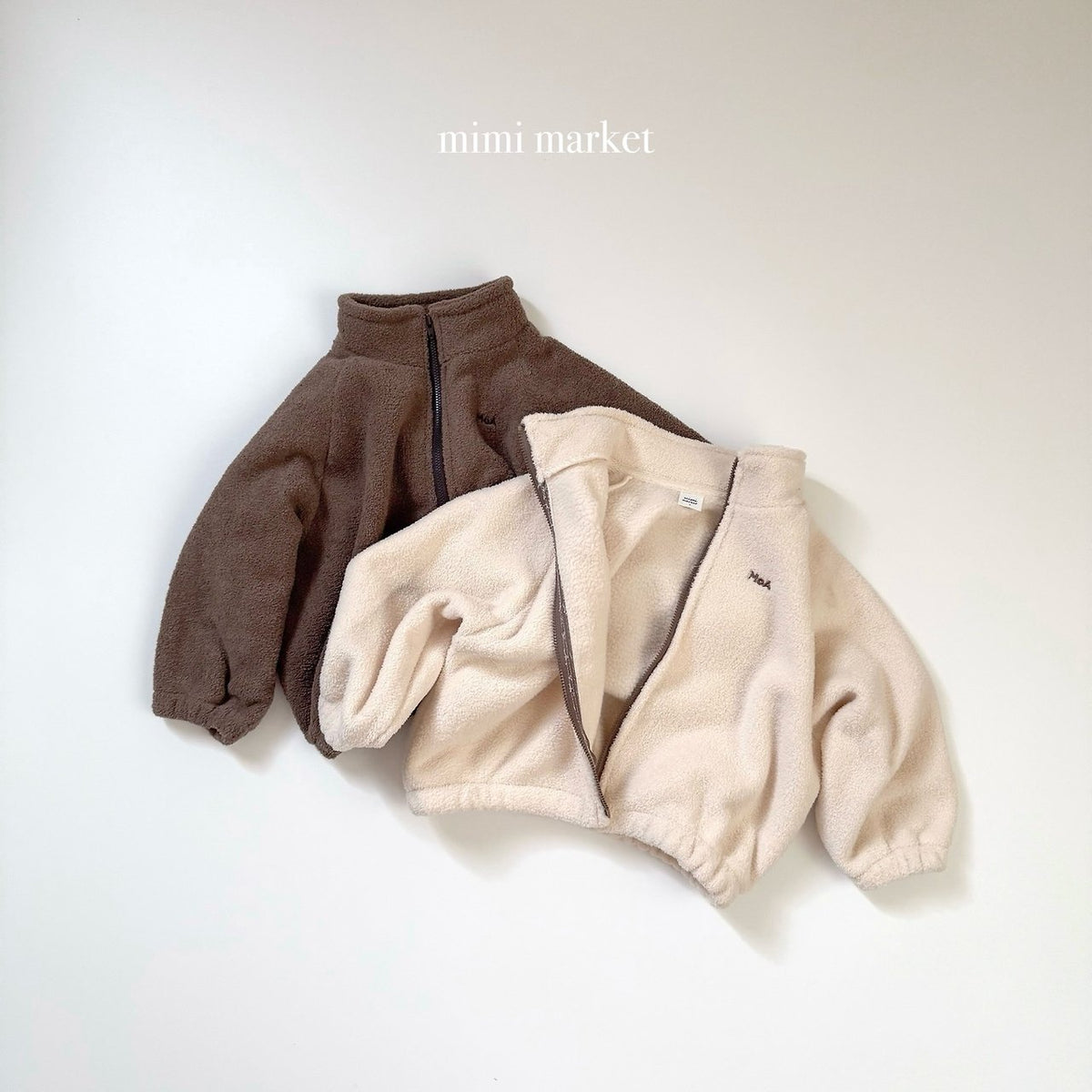 ［mimimarket］egg zip-up