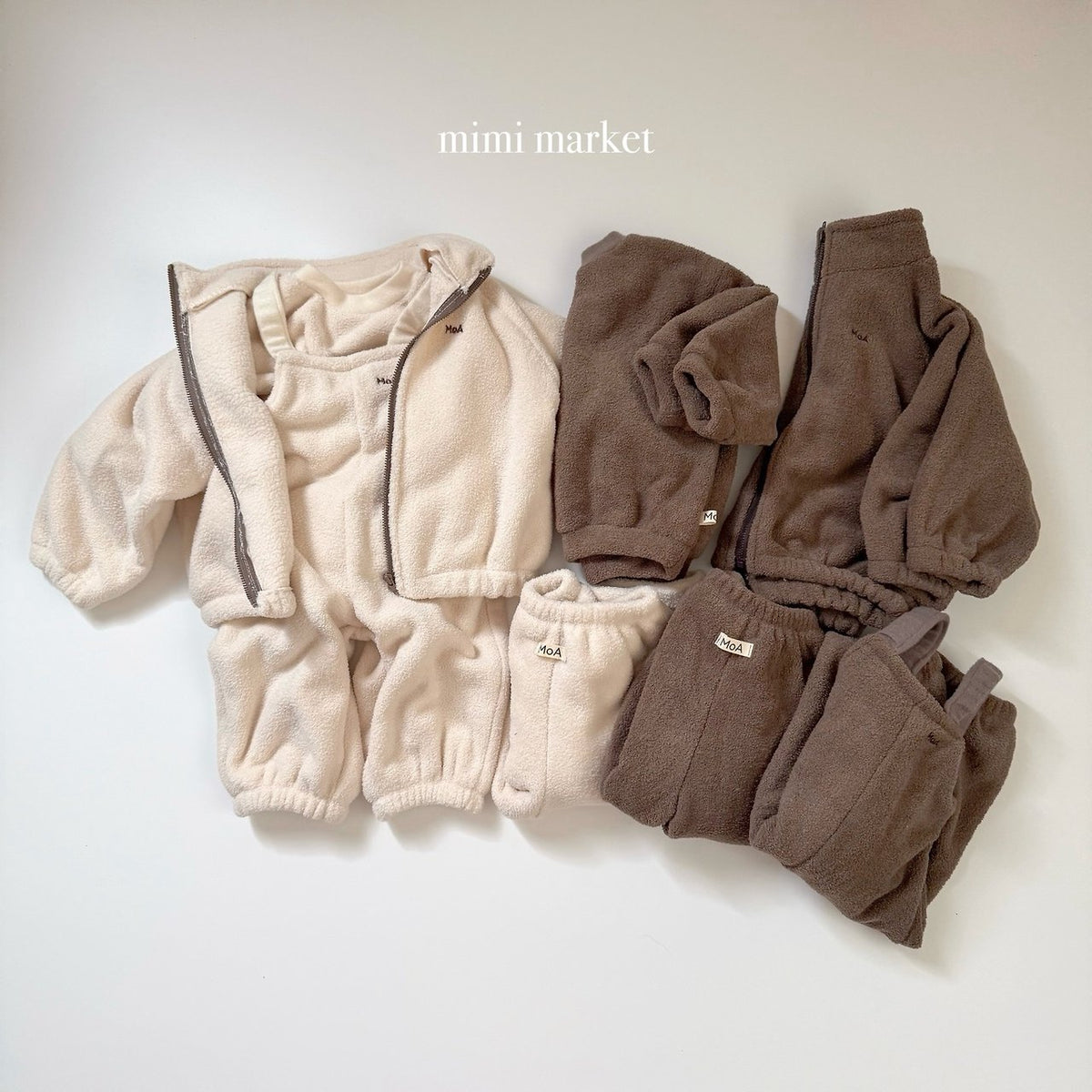［mimimarket］egg zip-up