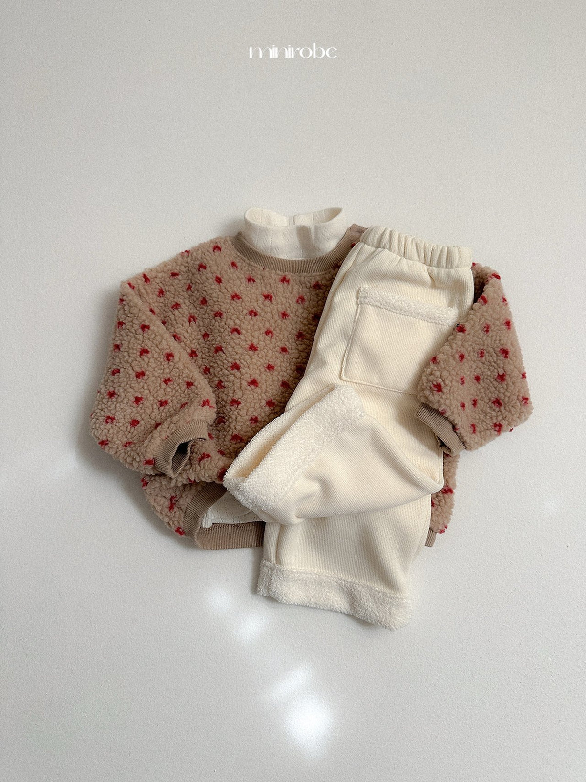 ［minirobe］eyelet turtleneck tee
